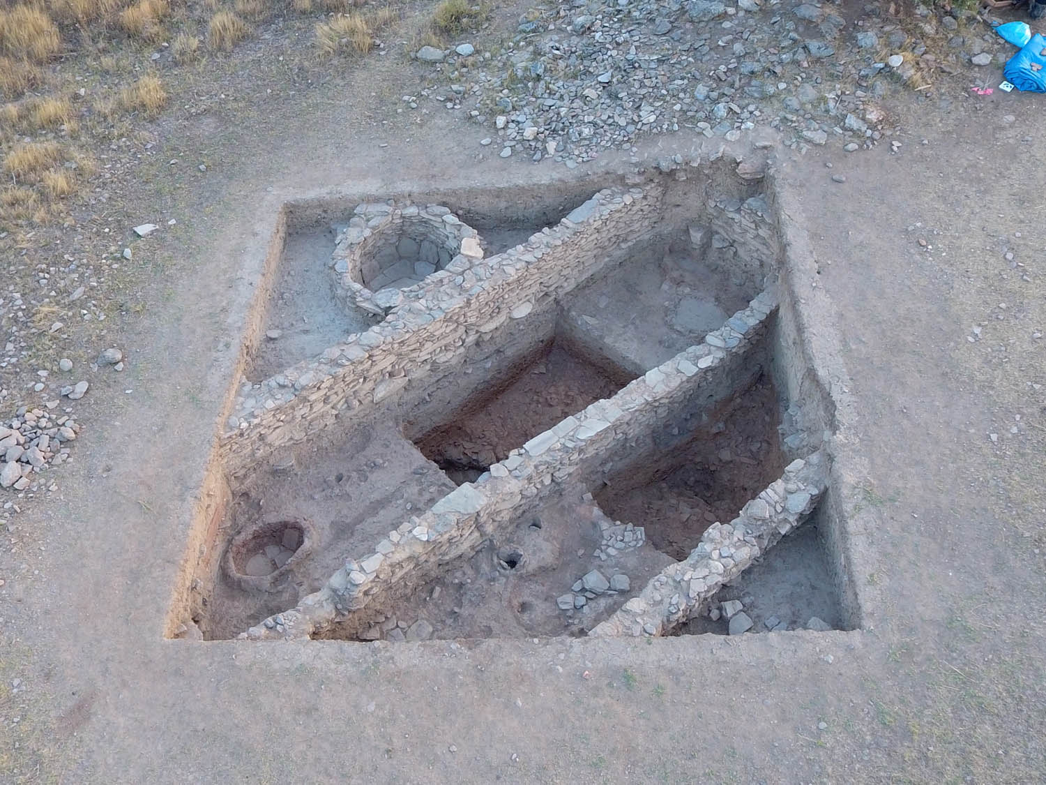 Figure 1
Aerial view of area 99.526 following the completion of excavations, looking N. The excavation area measures 9 by 9 m.